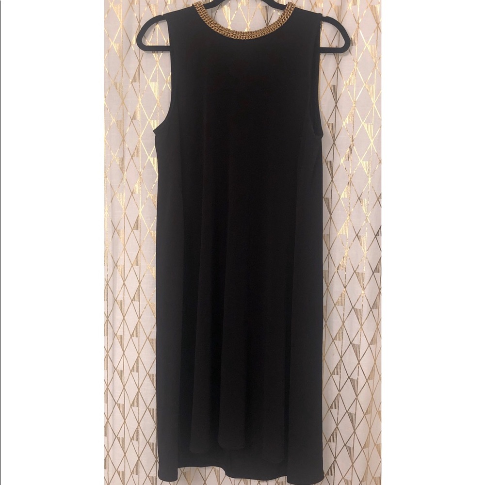 Black dress with gold chain detail